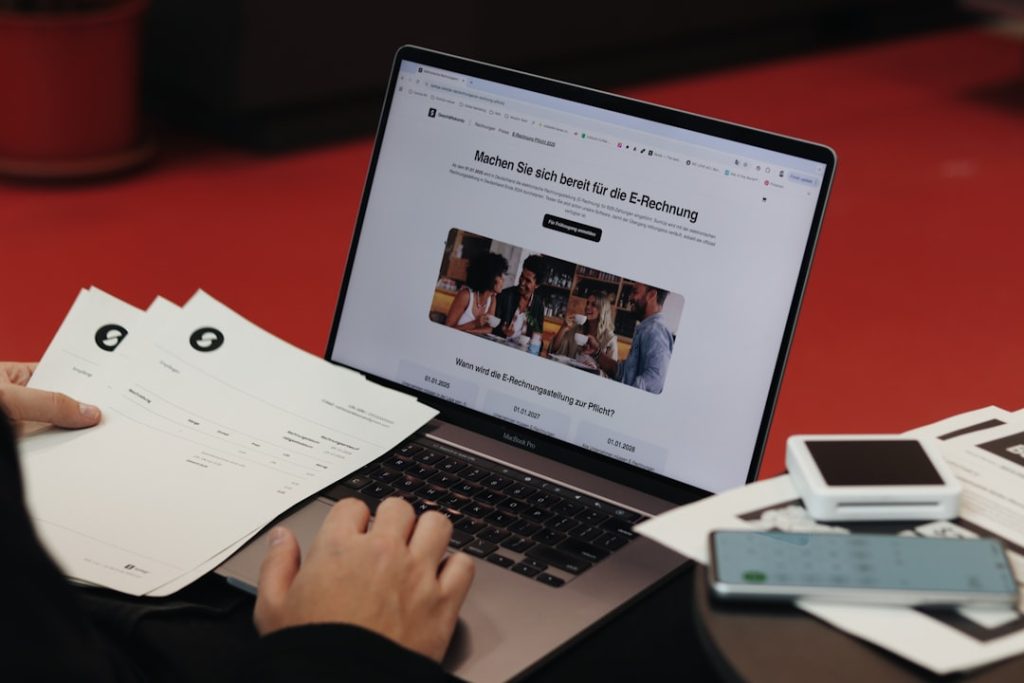 Demo Post 3 A professional working on a digital invoice. SumUp provides practical tools for efficient financial management.